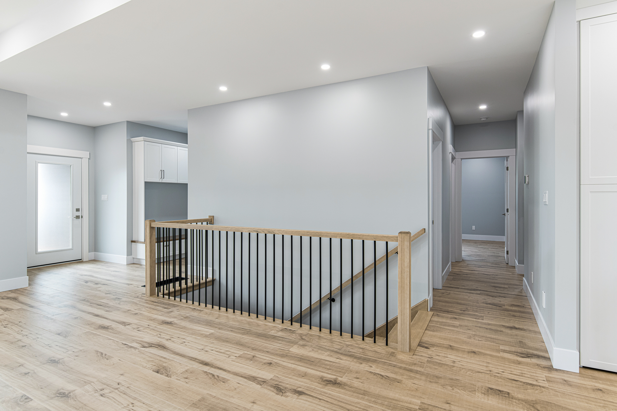 Hardwood stairs, interior doors, trim work, baseboard.