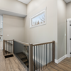 Hardwood stairs, modern railing, interior doors, trim work, base board.